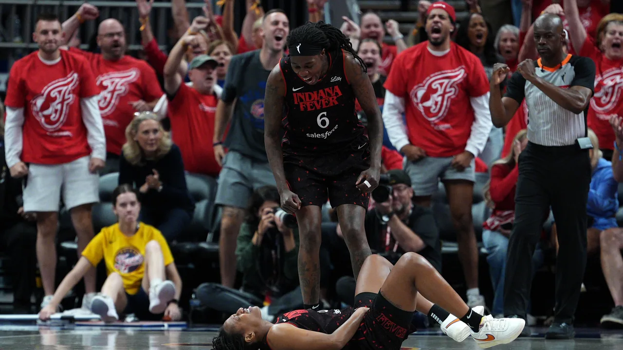 Natasha Howard celebrates during a WNBA playoff game in front of Indiana fans