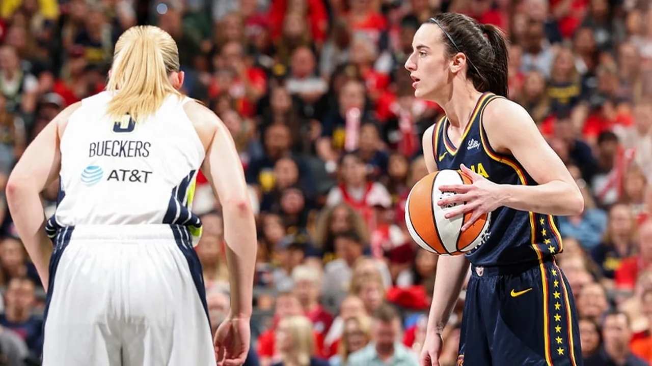 Indiana and Dallas WNBA players facing each other during a game