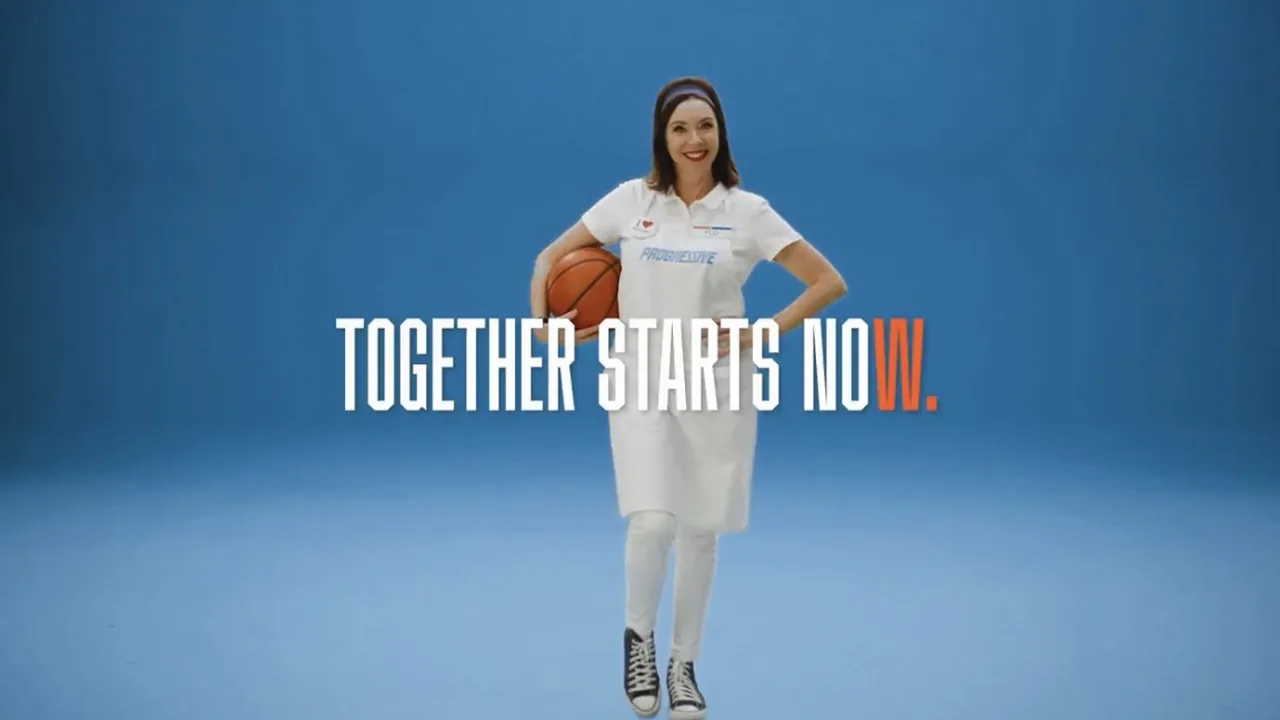 Official Cleveland WNBA campaign image with a woman holding a basketball and the words Together Starts Now